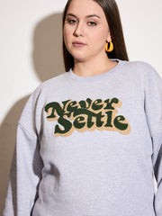 سويت شيرت نسائي من الصوف الرمادي الممزوج بشعار NEVER SETTLE