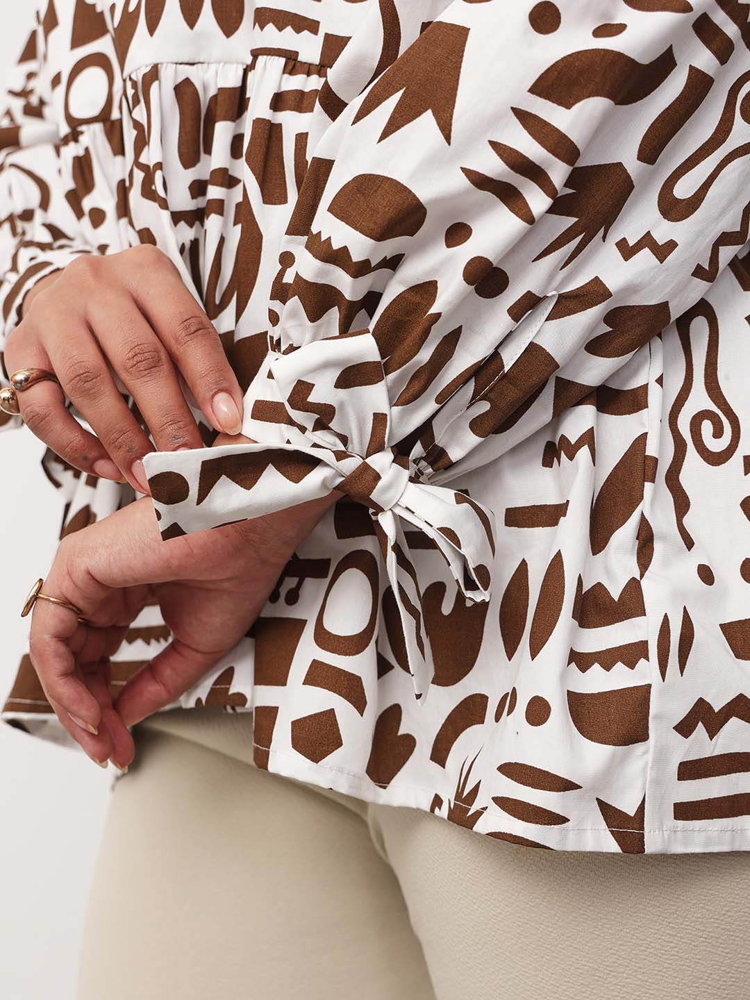 Women Brown & White Quirky Print Tie-Knot Peplum Top