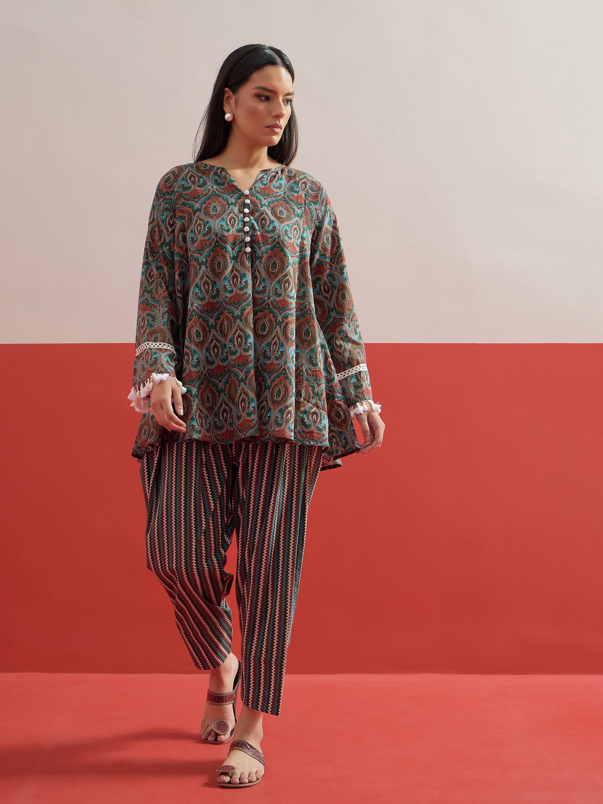 Green Floral Choga Kurta With Pharsi Salwar Shae by SASSAFRAS