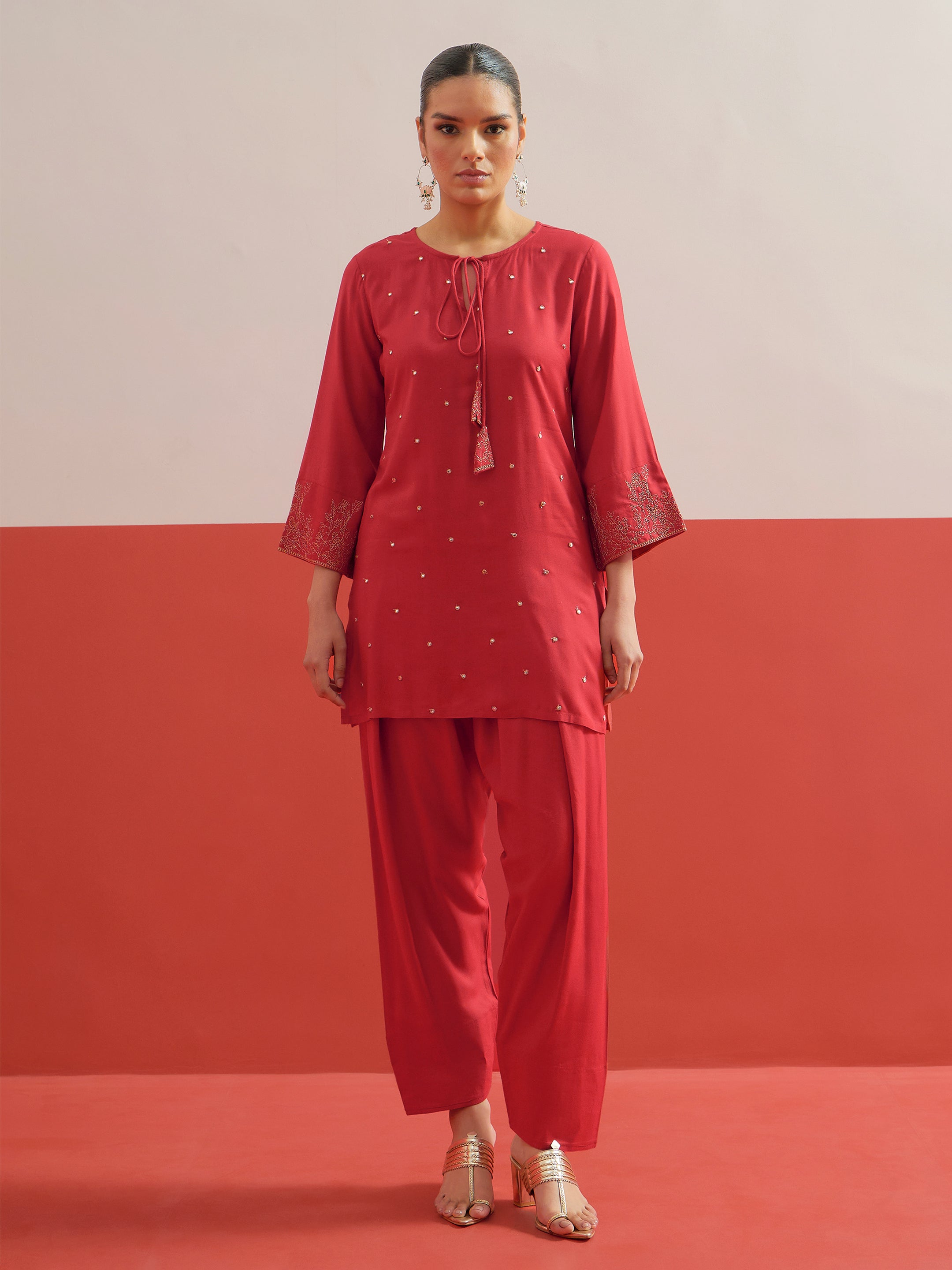 Red All Over Embroidered Short Kurti With Pharsi Salwar Shae by SASSAFRAS