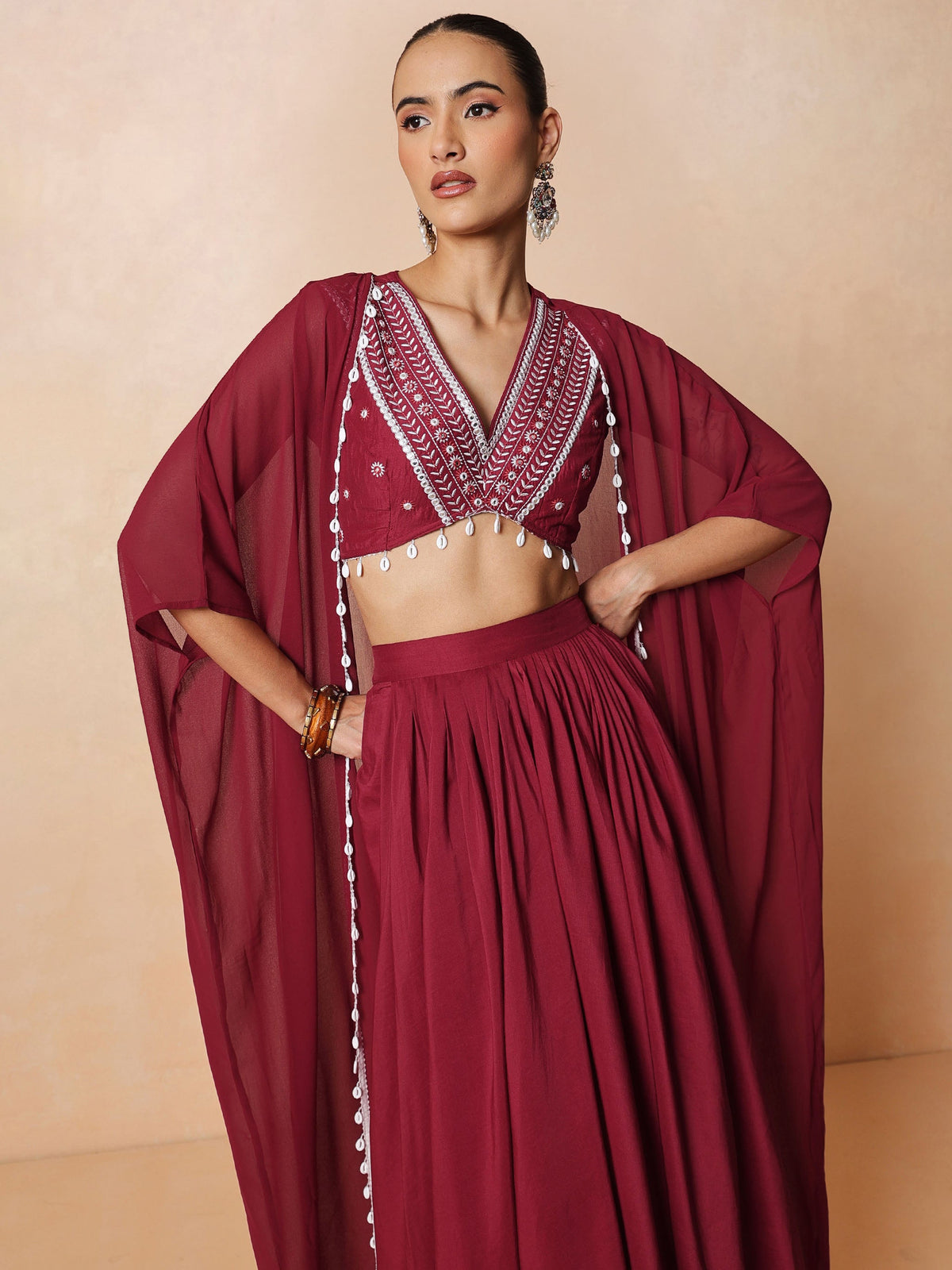 Maroon Embroidered Crop Top With Dhoti Skirt And Shrug-Shae by SASSAFRAS