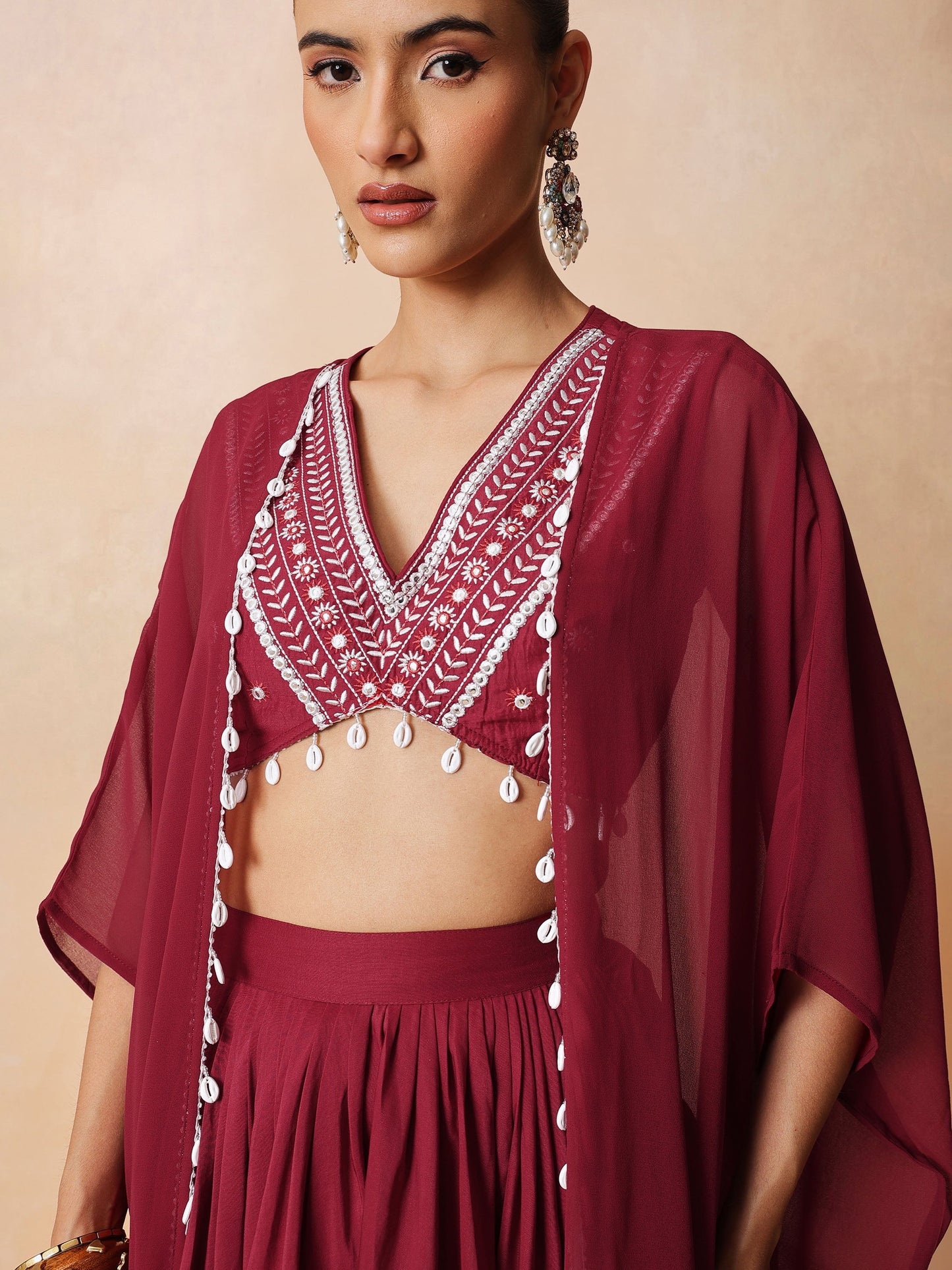 Maroon Embroidered Crop Top With Dhoti Skirt And Shrug-Shae by SASSAFRAS