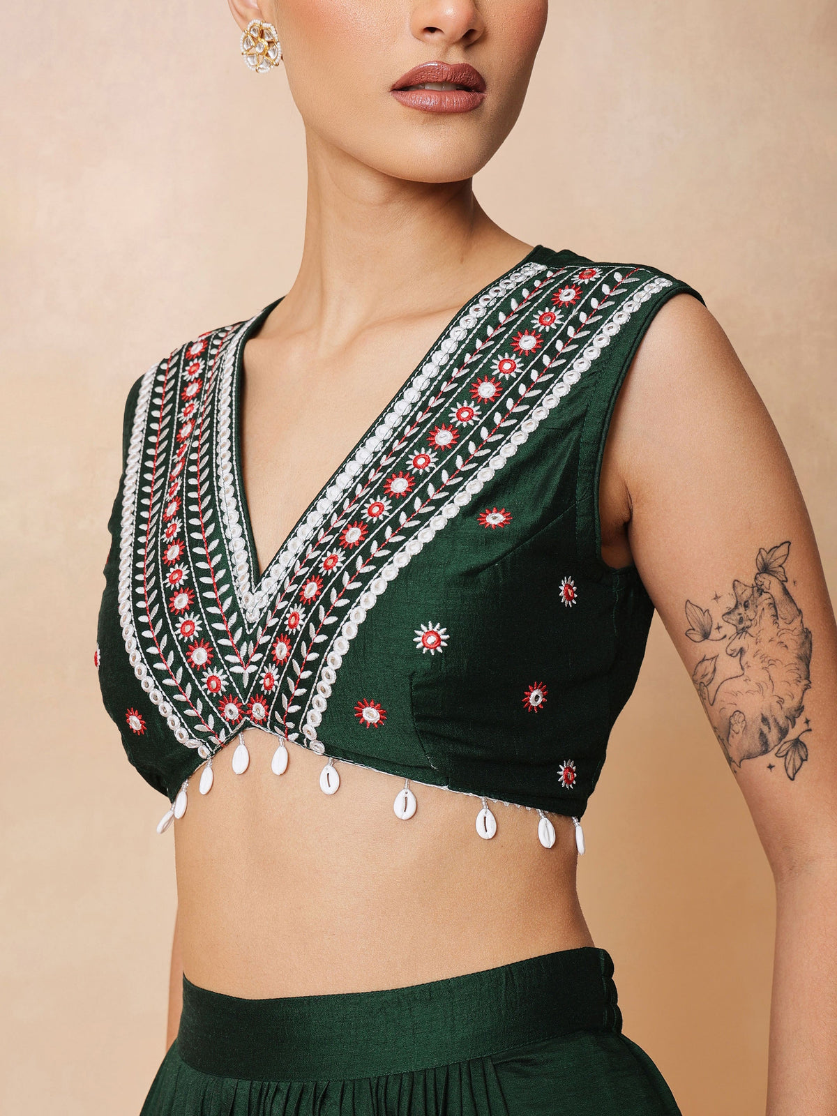 Emerald Green Embroidered Crop Top With Dhoti Skirt And Shrug-Shae by SASSAFRAS
