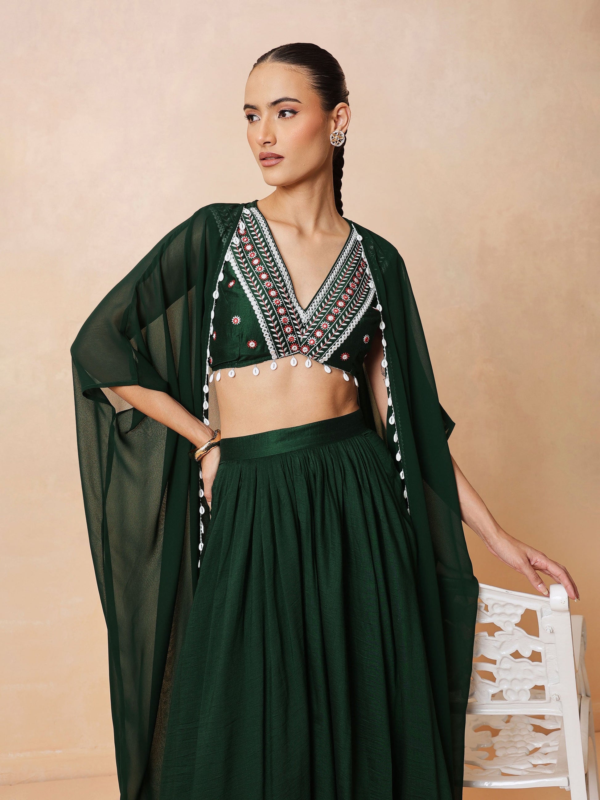 Emerald Green Embroidered Crop Top With Dhoti Skirt And Shrug-Shae by SASSAFRAS