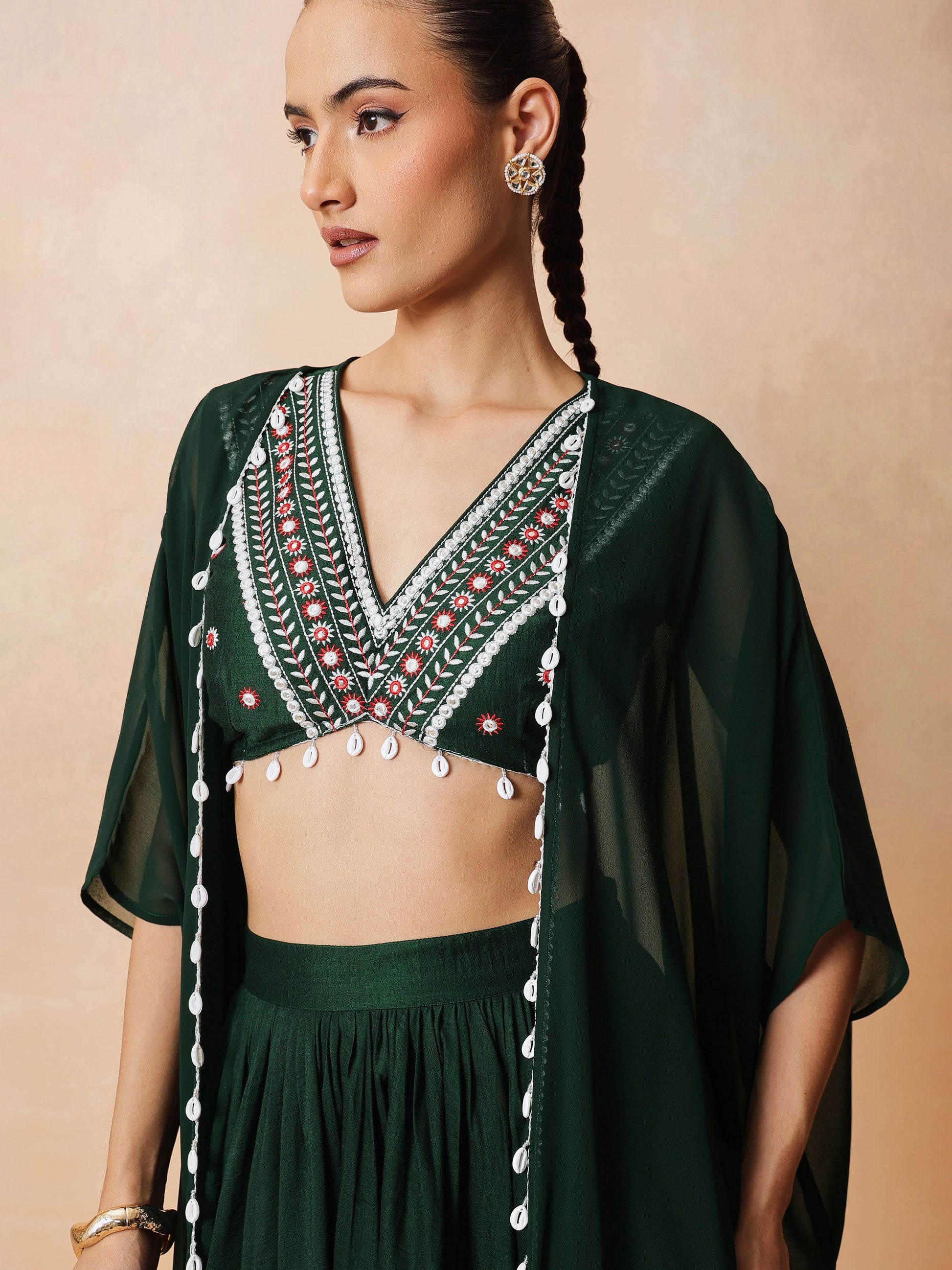 Emerald Green Embroidered Crop Top With Dhoti Skirt And Shrug-Shae by SASSAFRAS