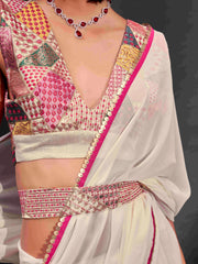 Cream solid georgette saree with embroidered blouse & belt