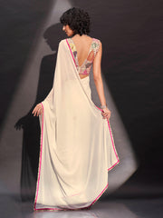 Cream solid georgette saree with embroidered blouse & belt