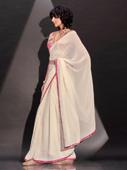Cream solid georgette saree with embroidered blouse & belt