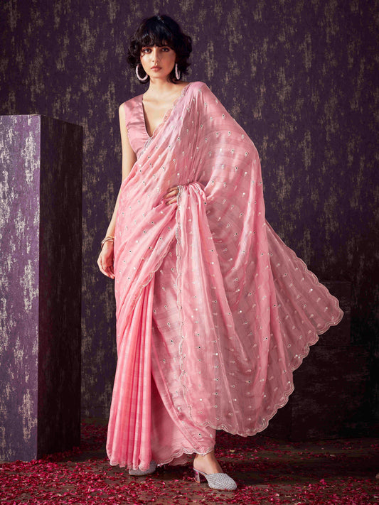 Peach colored striped satin chiffon saree with mirror embroidery on pallu and scalloped border