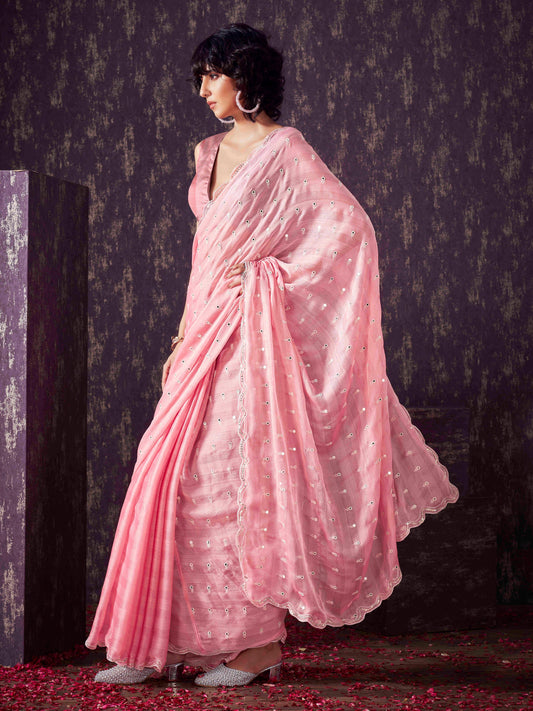 Peach colored striped satin chiffon saree with mirror embroidery on pallu and scalloped border