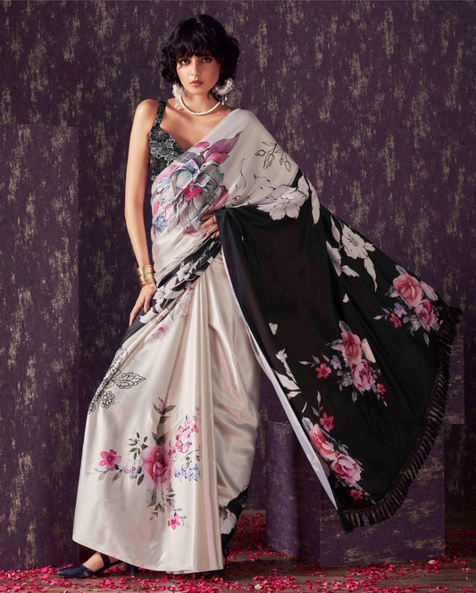 Tikhi Imli - Two ways wearable cream and black colored digital printed floral satin saree with tassles