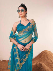 Firozi colored net embroidered saree