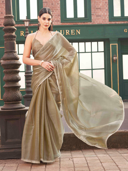 Metallic Green colored jimmy choo saree with brocade blouse