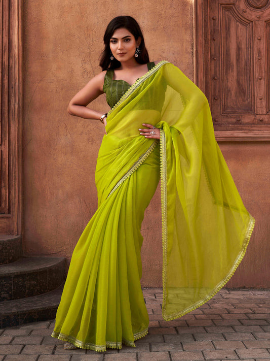 Tikhi Imli - Green colored shimmer chiffon saree with embellished lace and brocade blouse
