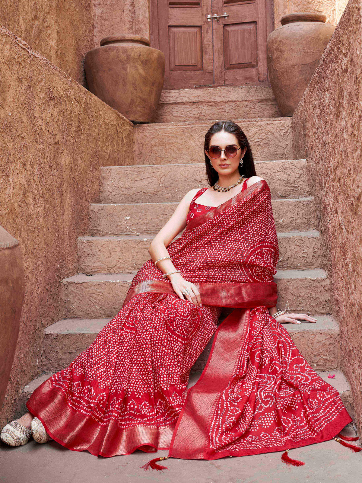 Ready to wear red colored cotton blend daily wear saree with woven border