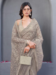 Beige colored shimmer net embroidered designer saree