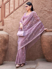 Beige colored shimmer net embroidered designer saree