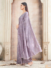 mauve colored saree with mirror embroidery on pallu and scalloped border