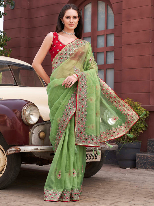 Green colored shimmer net embroidered saree