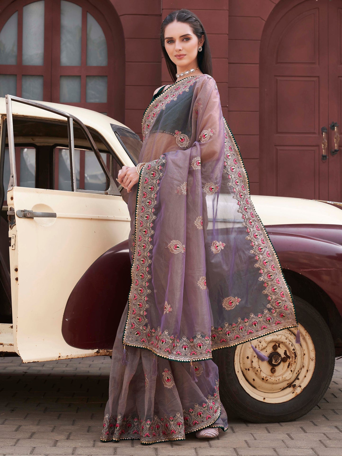 Green colored shimmer net embroidered saree