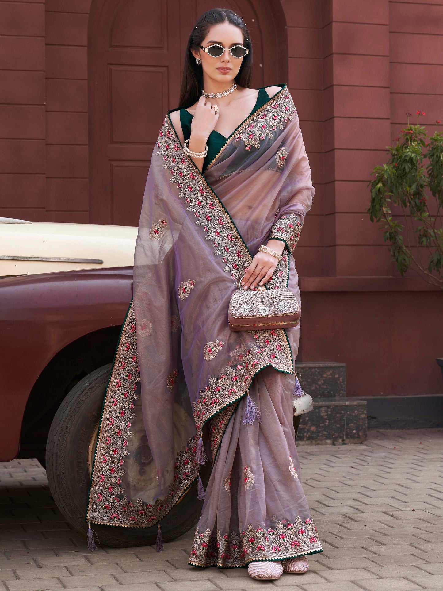 Green colored shimmer net embroidered saree
