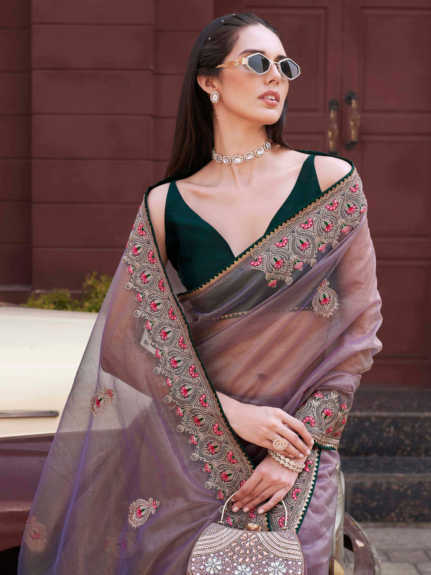 Green colored shimmer net embroidered saree