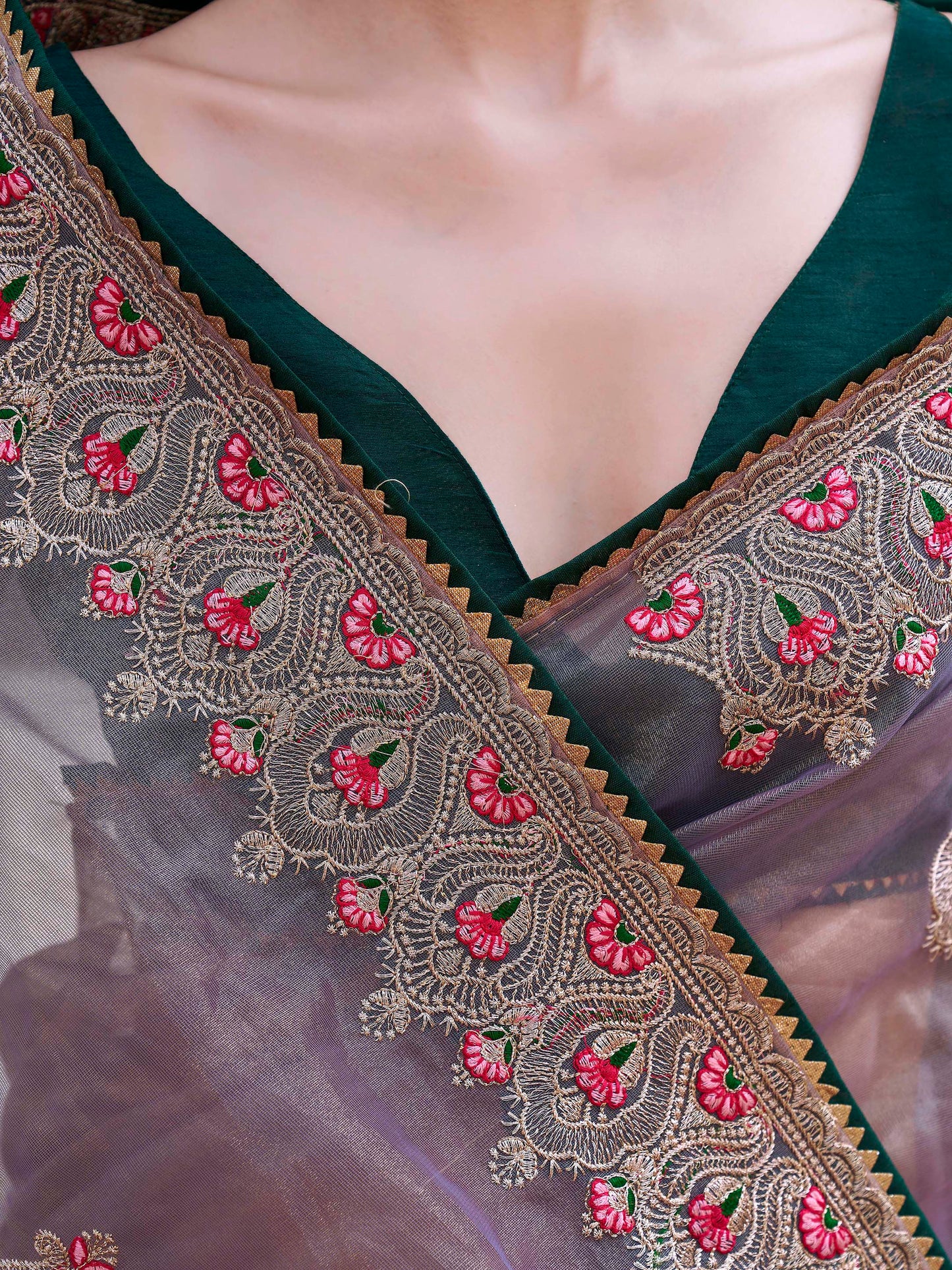 Green colored shimmer net embroidered saree
