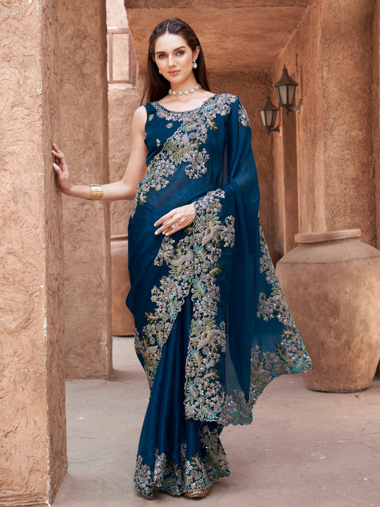 teal colored designer jimmy choo saree with sequinned embroidery border