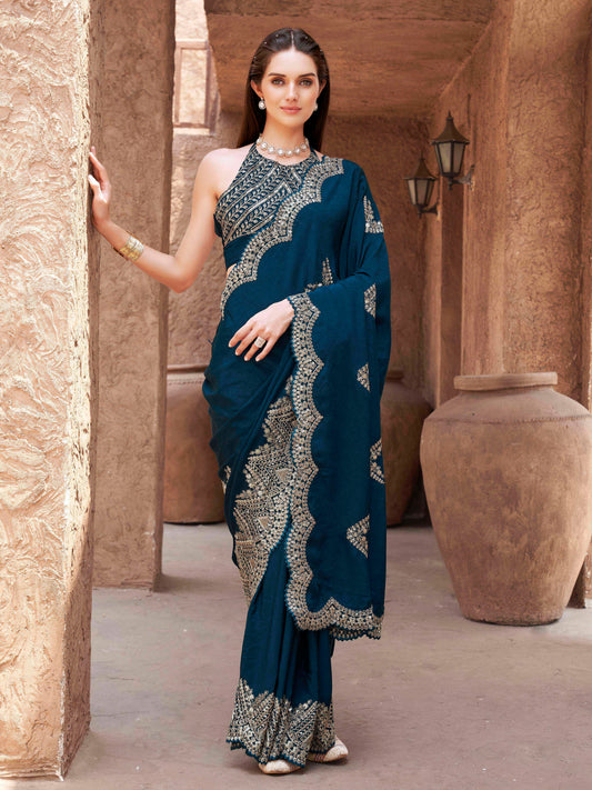 Teal colored designer saree with sequinned embroidery border