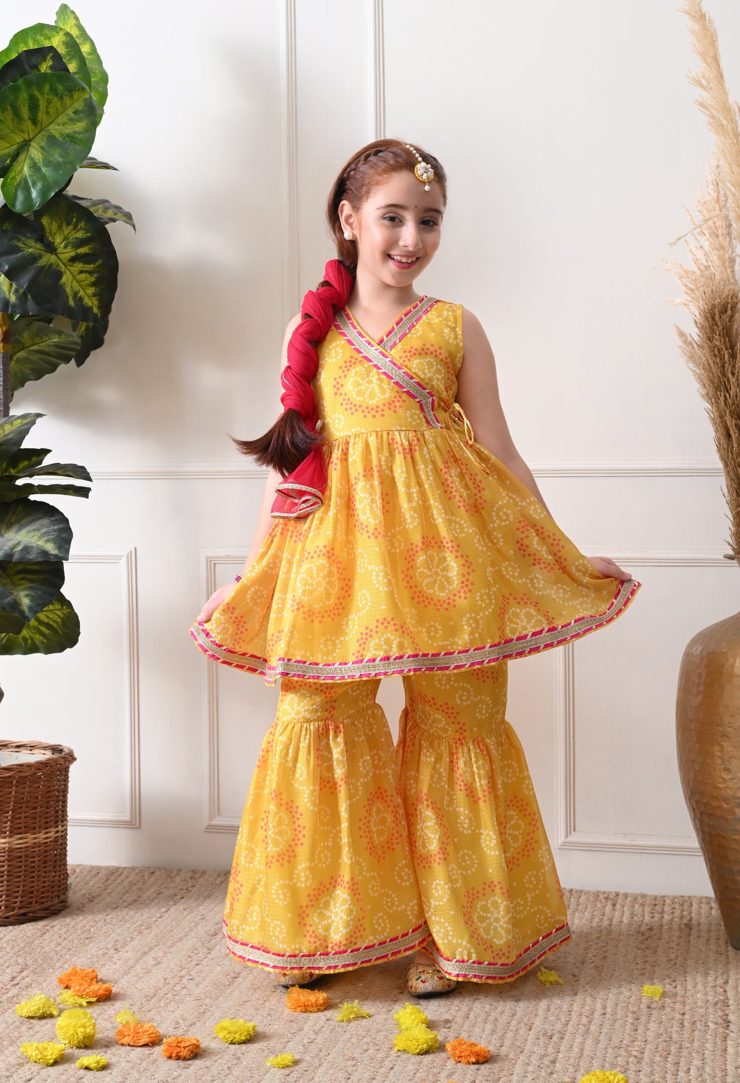 Girl's Yellow Bandhani Print Sleeveless Kurta Sharara Set with Dupatta