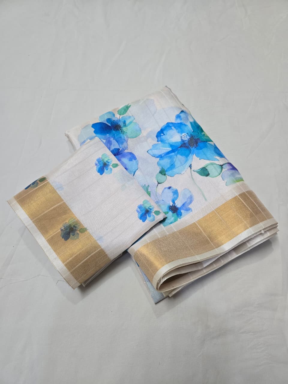 Soft Dola Silk saree with shaded style prints.