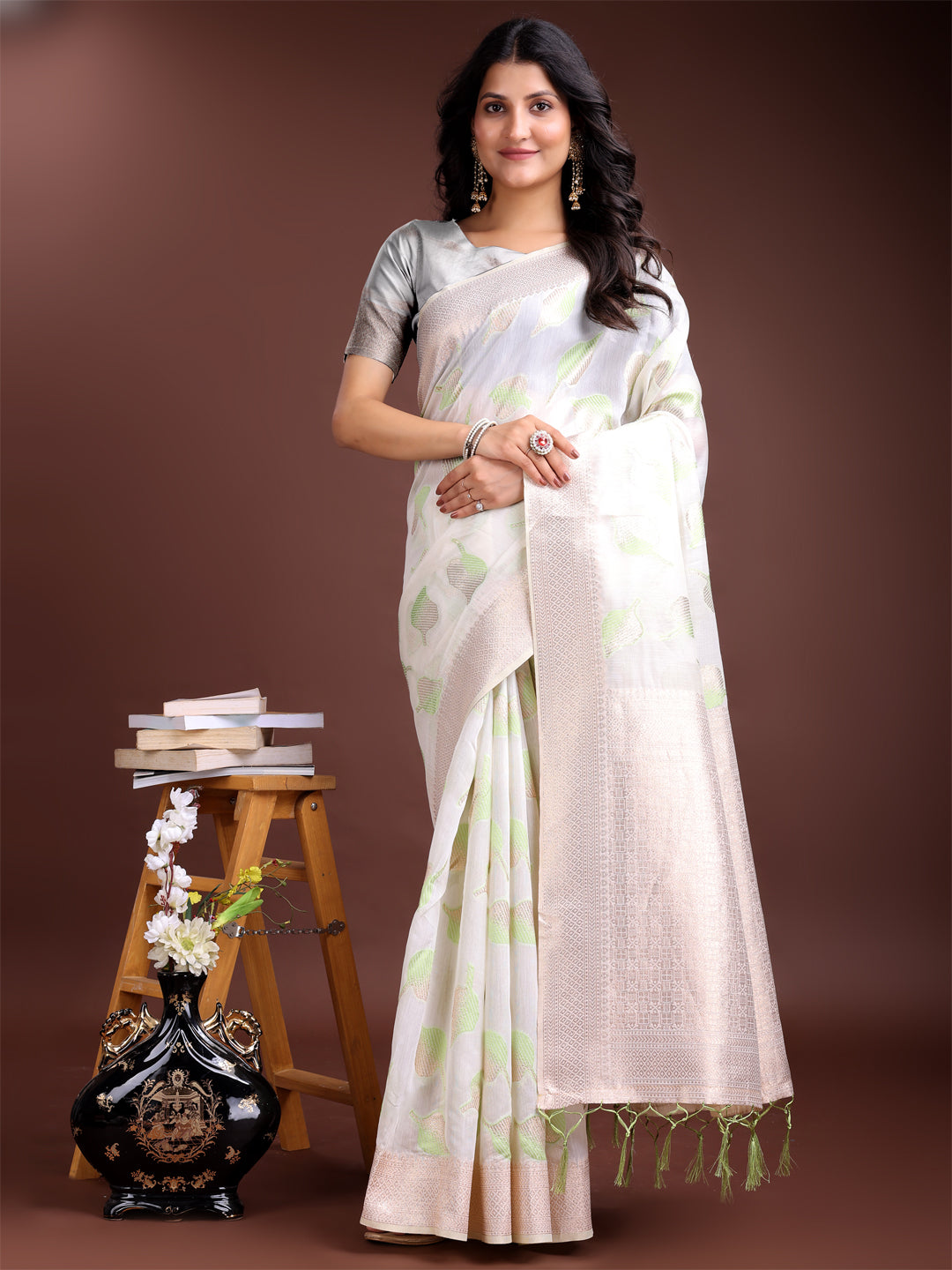 Elegant White & Light Green Leaf Print Cotton Saree for Women with Zari Border & Tassels – Soft & Lightweight Daily Wear Saree