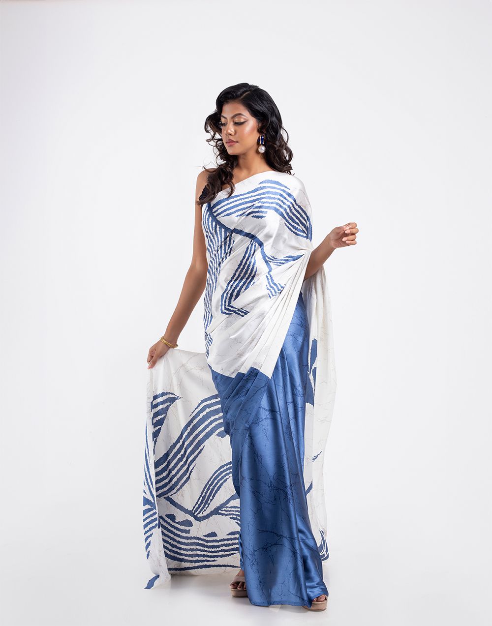 Soft Modal crepe saree with shaded style prints.