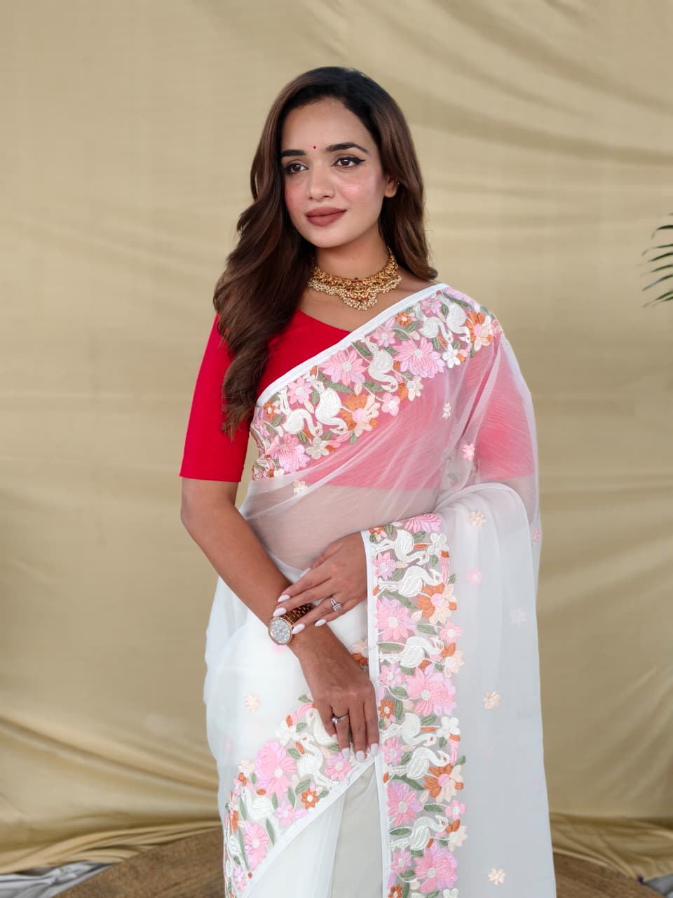 CHIFFON SAREE WITH ALL OVER DESIGNER EMBROIDERY PATTERN ALONGWITH BEAUTIFUL MOTIFS.