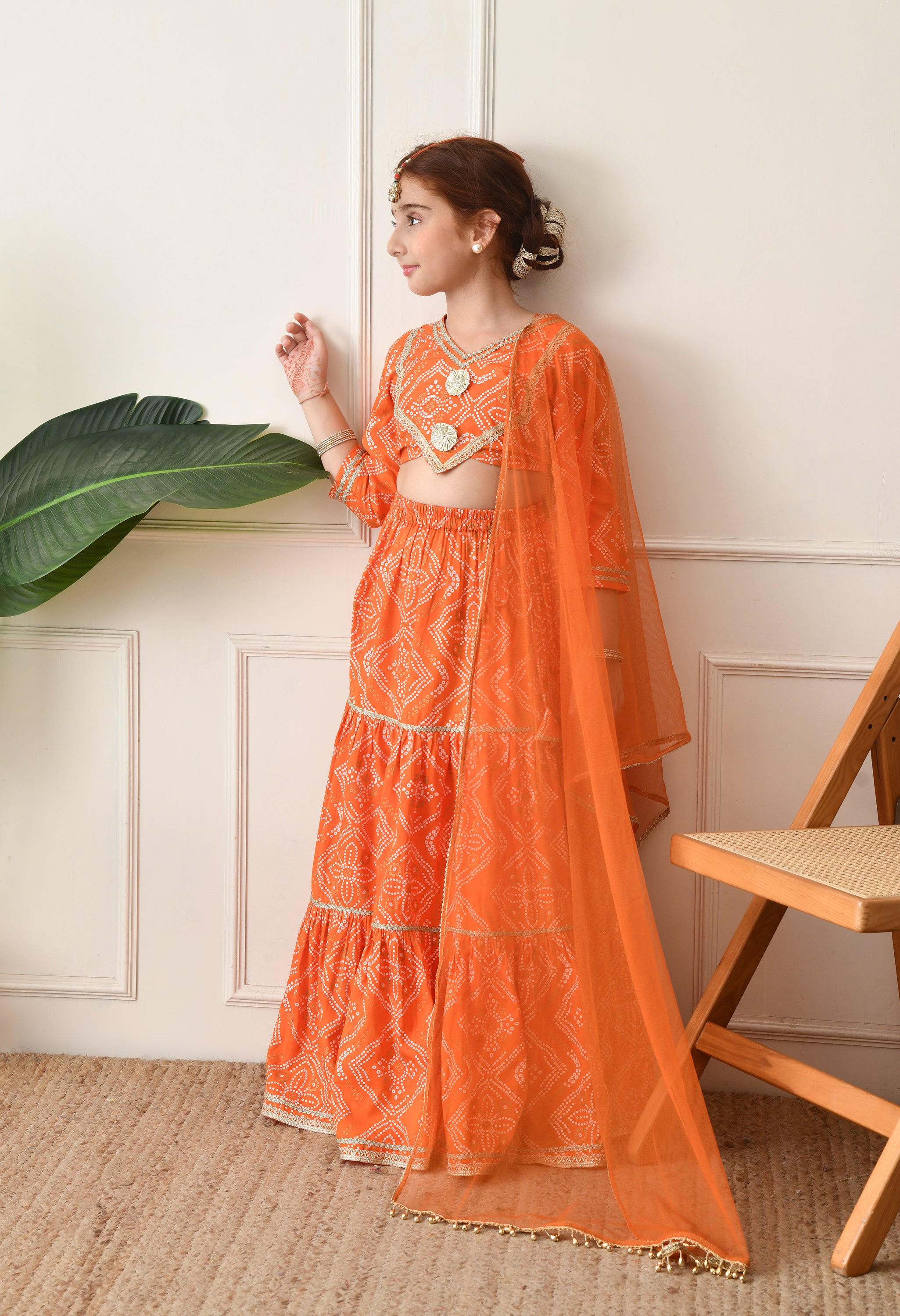 Girls Bright Orange Bandhani Printed Lehenga Choli Set with Net Dupatta