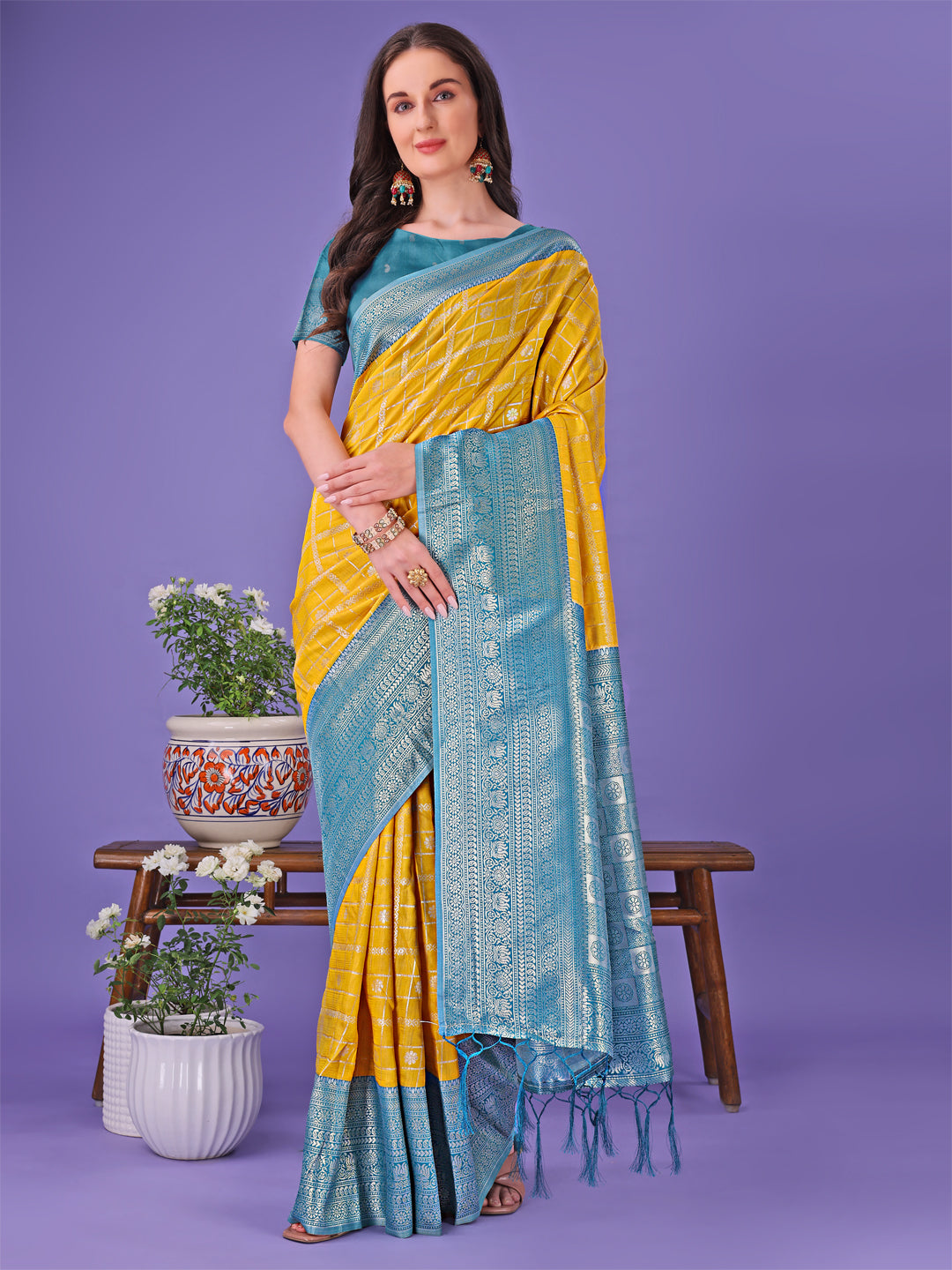 Vibrant Yellow & Blue Lichi Silk Saree with Rich Woven Border and Contrast Blouse – Festive & Wedding Wear