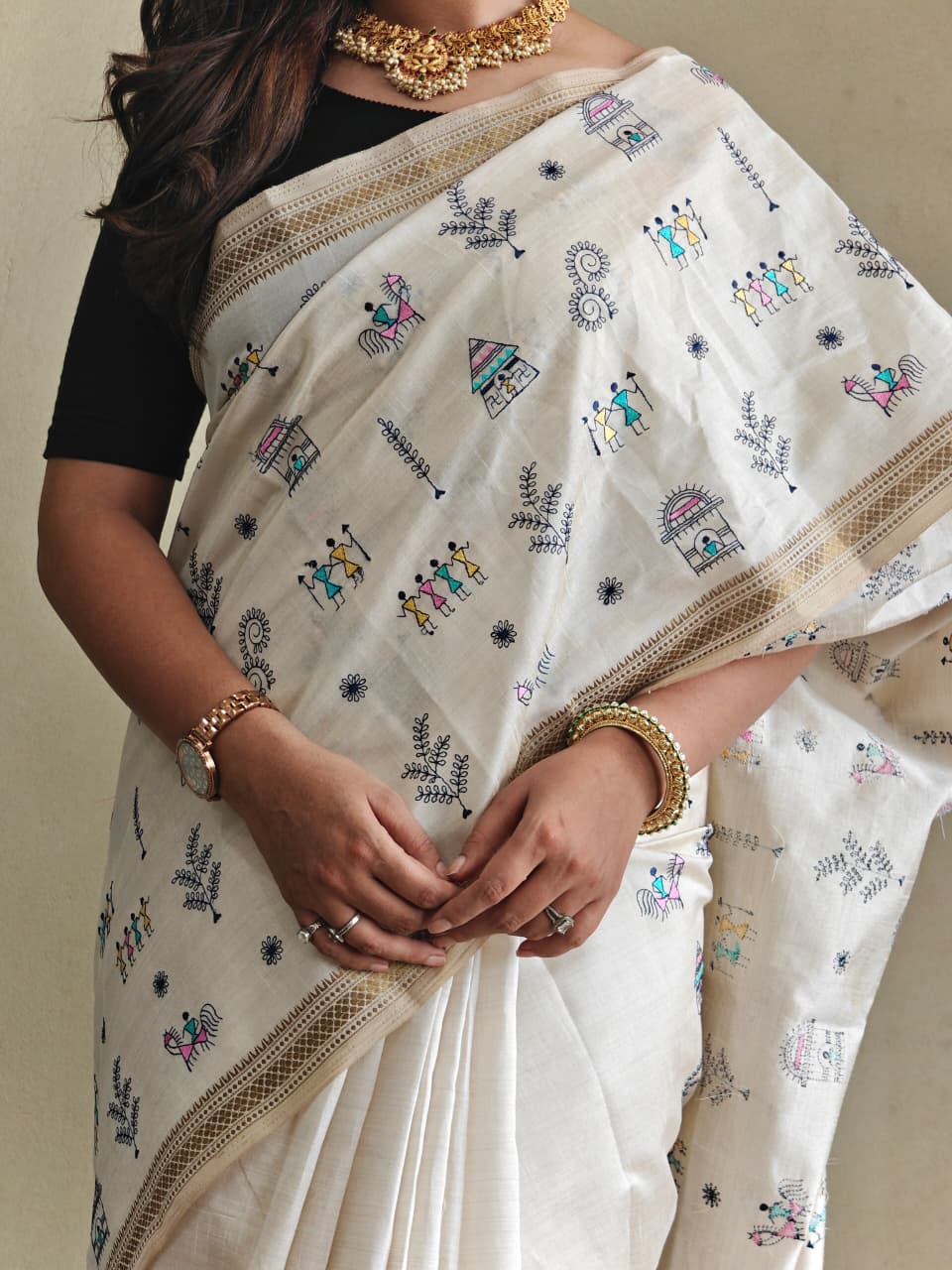 PURE LOOM TUSSAR SAREE WITH ALL OVER WORLI EMBROIDERY PATTERN,  COPPER ZARI BORDER AND ZARI WOVEN PALLU.