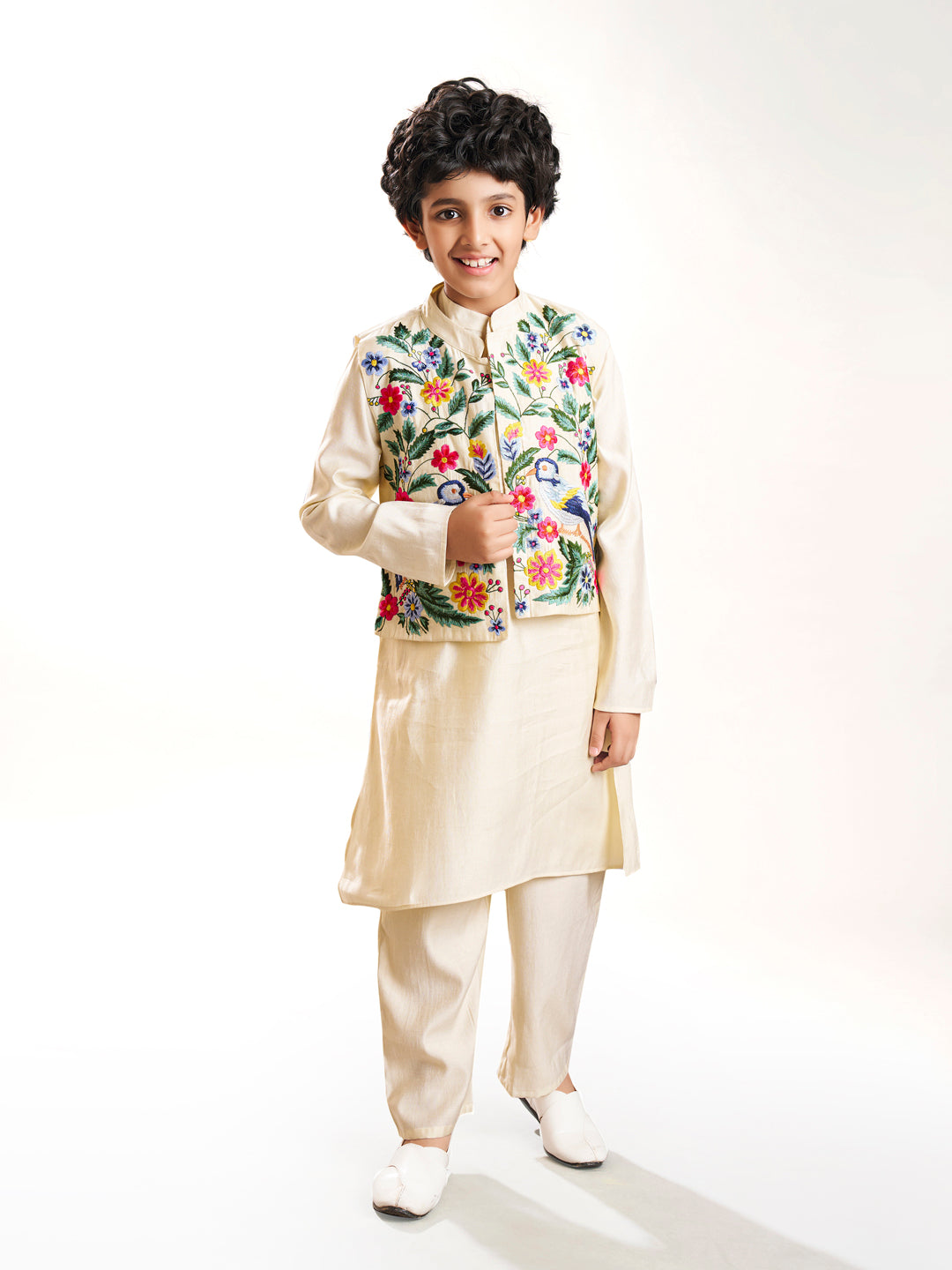 Boys off white kurta pajama with a off white embroidry jacket