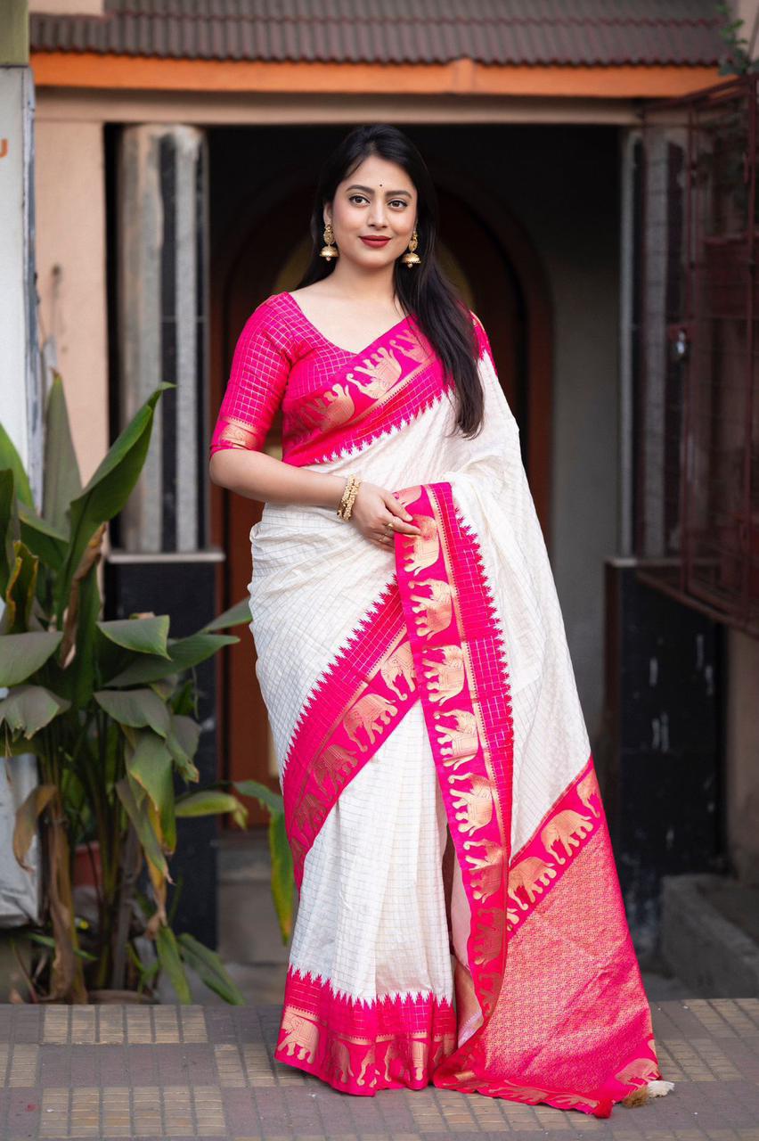 sift silk saree with zari woven chex and with elephant border and rich pallu.Cotton tasslels on pallu.
