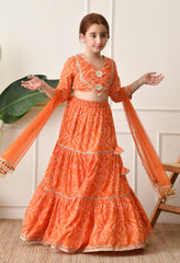 Girls Bright Orange Bandhani Printed Lehenga Choli Set with Net Dupatta