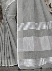 Elegant Peach Woven Linen Saree with Contrast Zari Border & Tassels – Soft & Breathable Party Wear