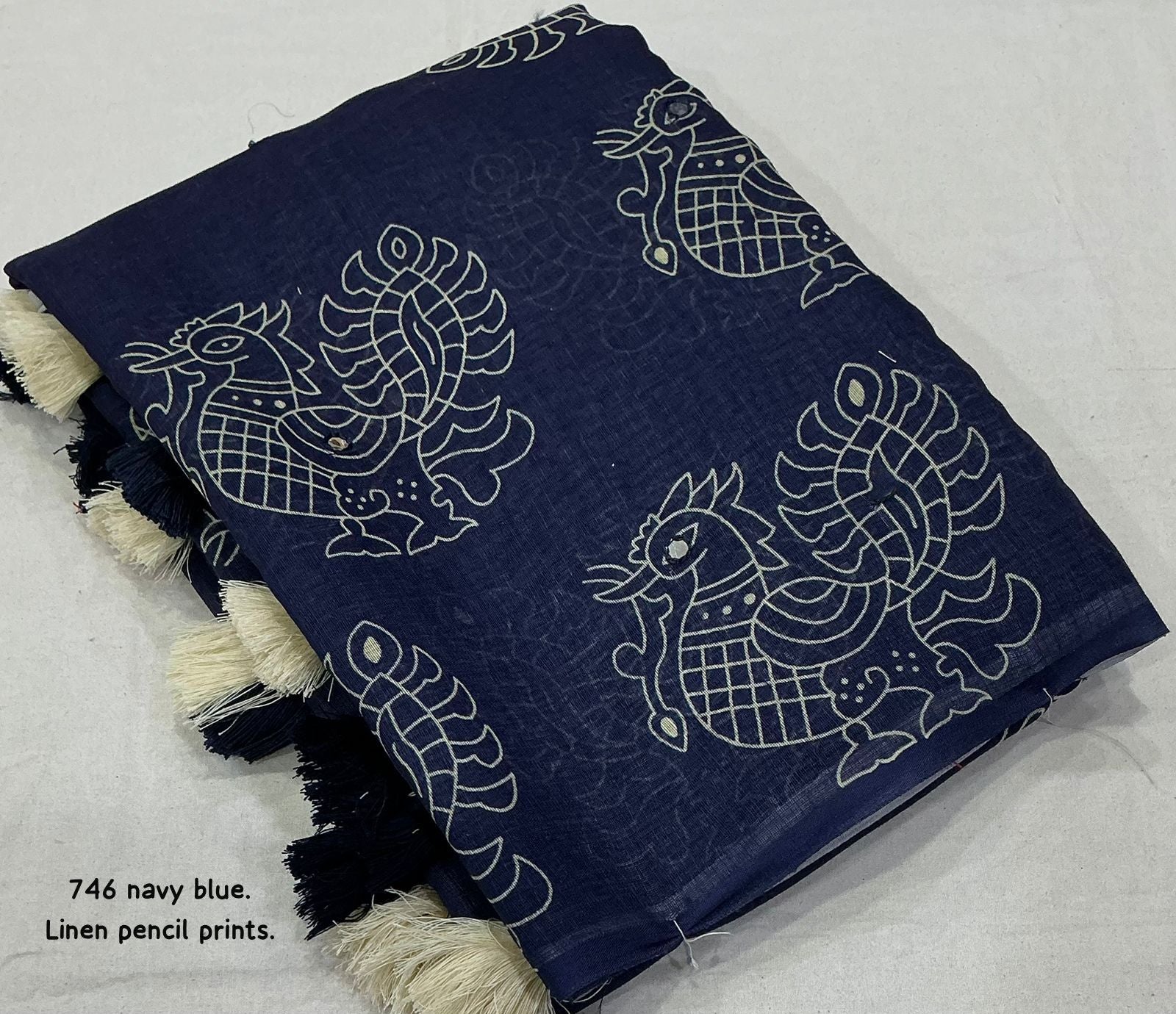 Soft linen saree with shaded style prints.