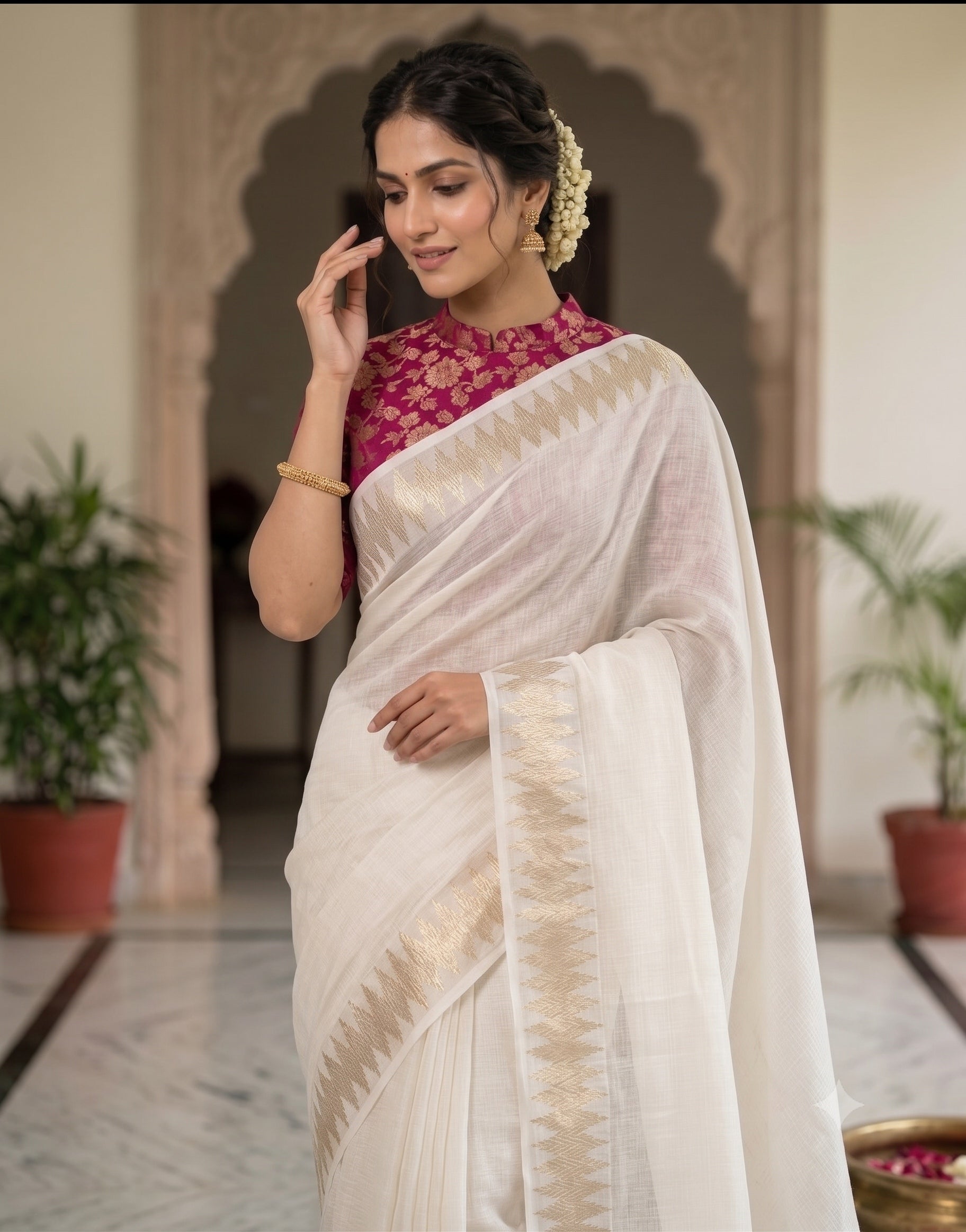 soft kota saree with zari woven zig zag border.cotton tassels on pallu.contrast zari woven banarasi silk blouse
