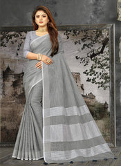 Elegant Peach Woven Linen Saree with Contrast Zari Border & Tassels – Soft & Breathable Party Wear