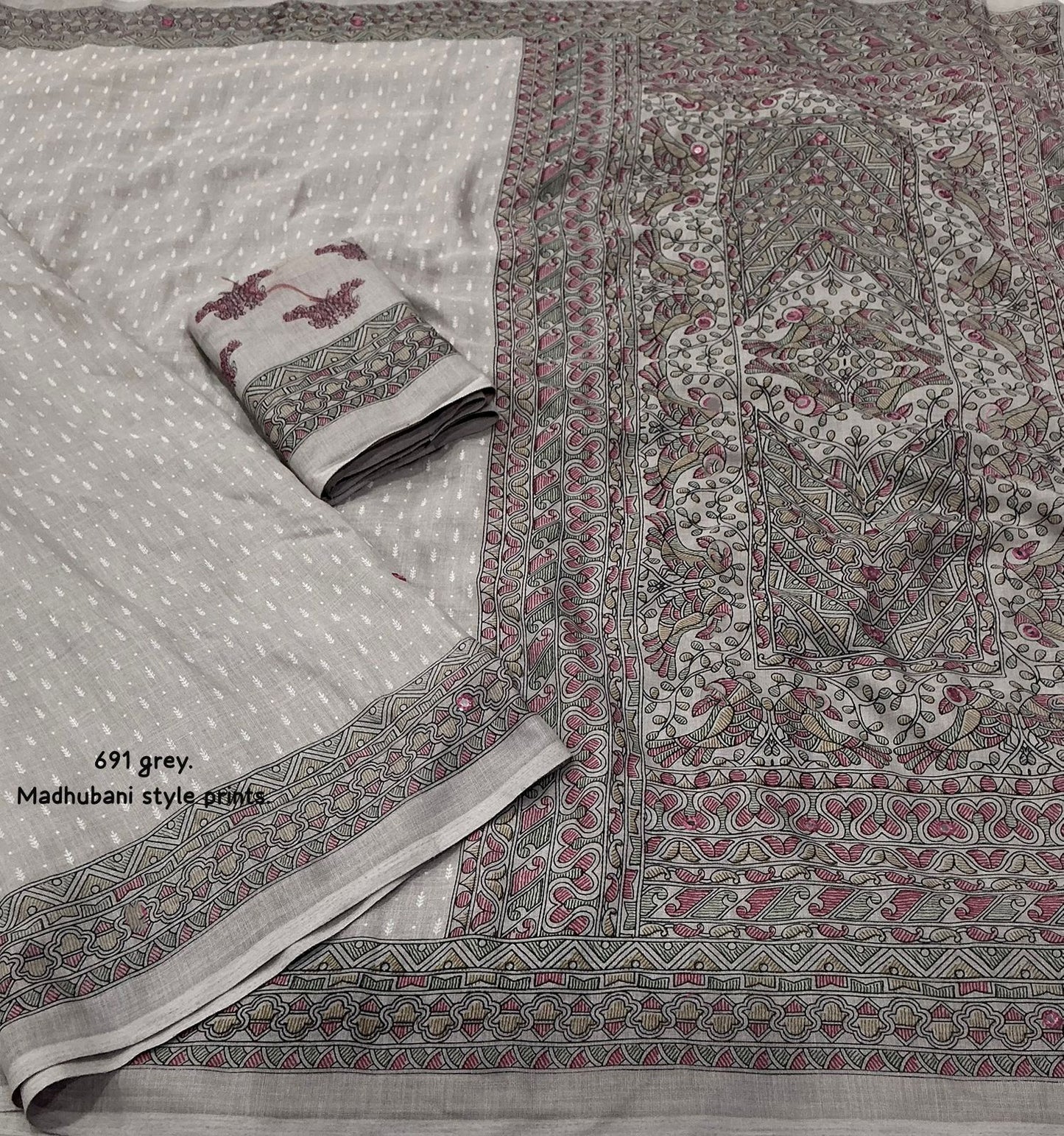 Soft linen saree with shaded style prints.