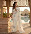 soft bubble crush saree in off white color.Lucknowi style embroidery border with bird emboridary.Pereftly matched net embroidery blouse.