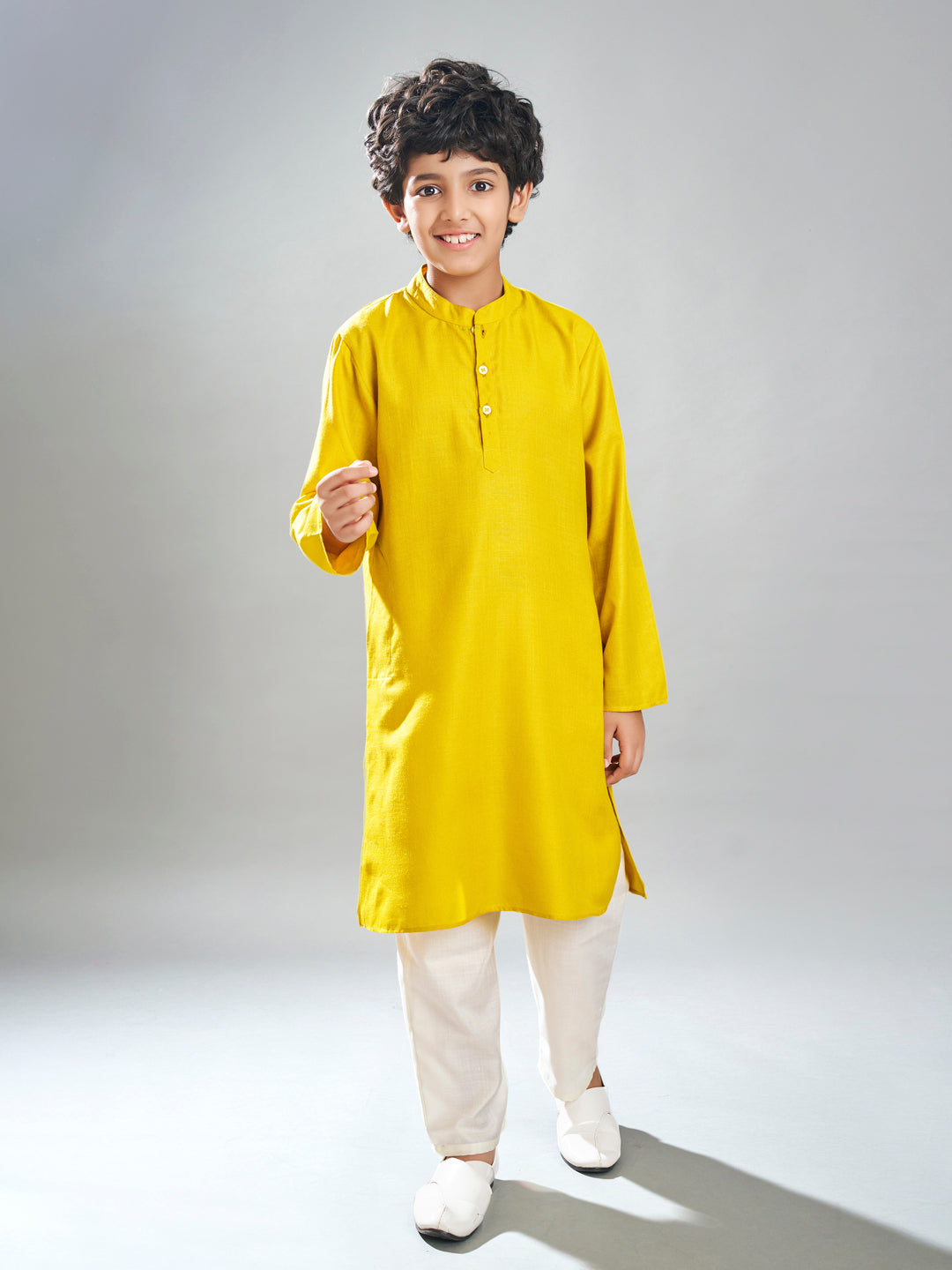Boys yellow kurta & off white pajama with a multi print jacket