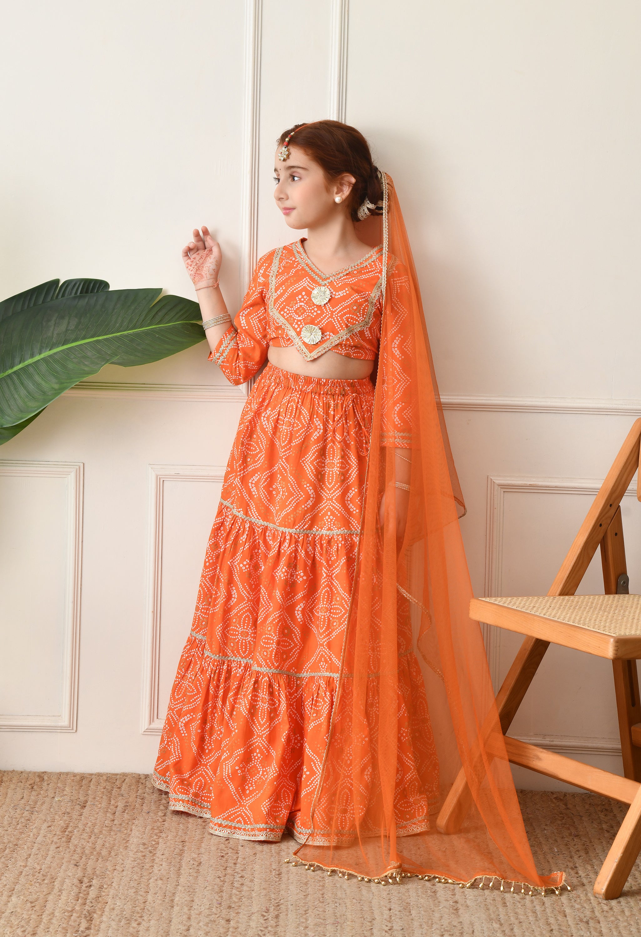 Girls Bright Orange Bandhani Printed Lehenga Choli Set with Net Dupatta