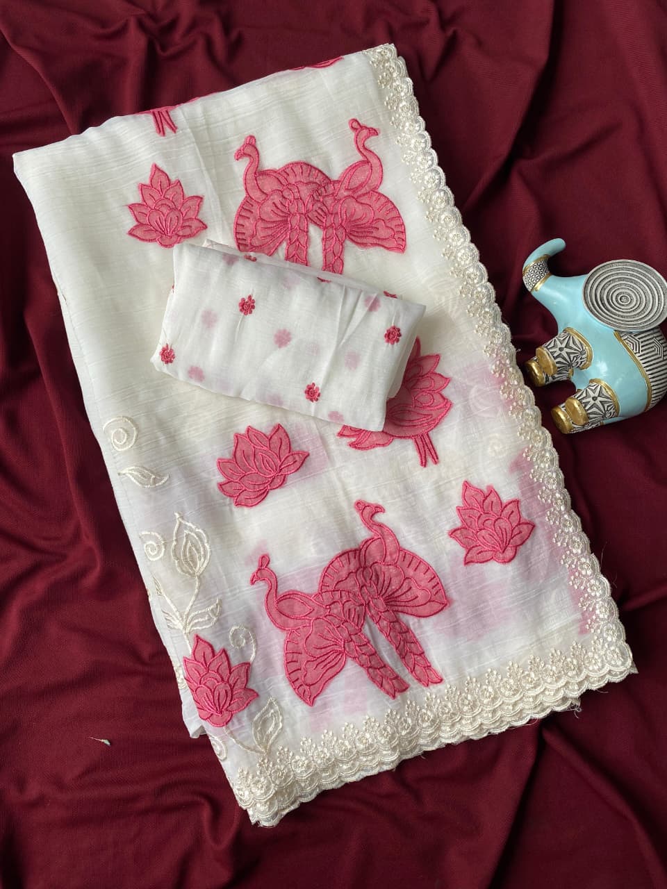 silk Saree with applique work pattern all over the Saree with embroidery and scallop  Border all over