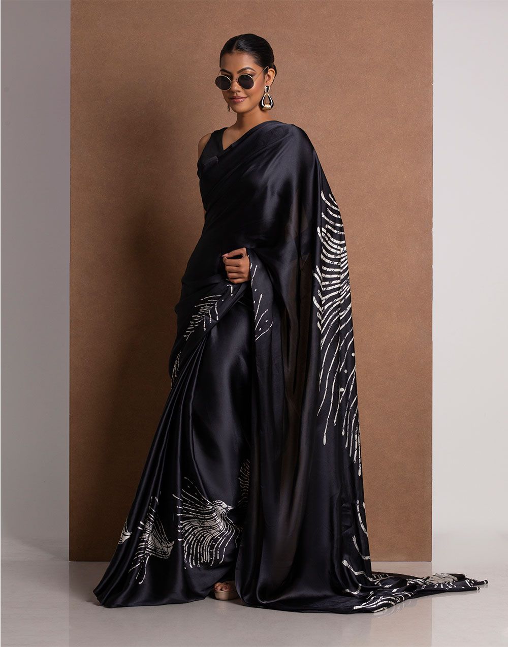 Soft Modal crepe saree with shaded style prints.